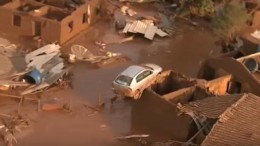 A screen shot of the wreckage caused by a large-scale tailing dam breach at the Samarco iron-ore joint venture in Brazil's Minas Gerais State. Source: YouTube