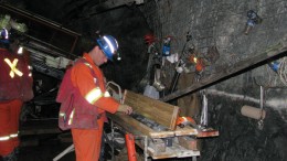 A geologist examines drill core in early 2015 on a drill platform 244 metres below the surface at Rubicon Minerals' Phoenix F2 gold deposit in northwestern Ontario. Credit: Rubicon Minerals