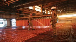 Workers spray copper cathode at Barrick Gold and Antofagasta's Zaldivar copper mine in northern Chile. Credit: Barrick Gold