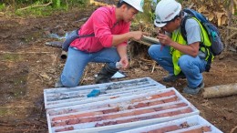 Workers study drill core at RTG Mining's Mabilo copper-gold-magnetite project in southeastern Luzon in the Philippines. Credit: RTG Mining