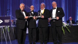 From left: Ed Thompson, chair of the PDAC Awards Committee, with Bill Dennis Award recipients Stephen Roman, Robert Cudney and John Whitton. Photo by Envisiondigitalphoto.com