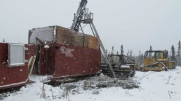A drill rig in 2013 at TomaGold’s 45%-owned Monster Lake gold property, 45 km southwest of Chibougamau in Quebec. Credit: TomaGold.