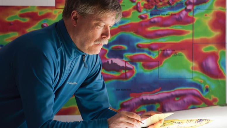 Kevin Montgomery, Gowest’s exploration manager, plans drill holes. Credit: Gowest Gold.