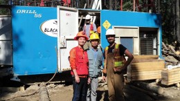 At a drill site on Serengeti Resources’ Kwanika copper-gold property, 250 km east of Smithers, B.C,. from left: Posco Daewoo’s Ji Su Go and Kyu-Youl Sung, and geologist Cole Godfrey. Credit: Serengeti Resources.
