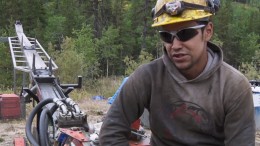 Cropped screenshot from the film "Koneline: our land beautiful" showing a Tahltan driller in northwestern B.C.