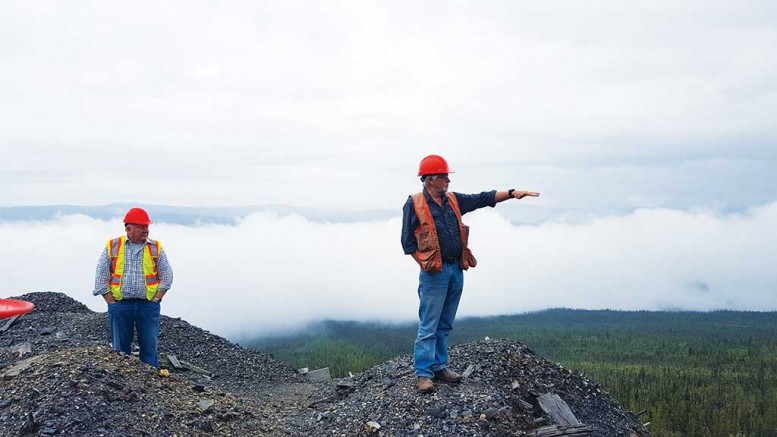 Alexco Resource’s president and CEO Clynton Nauman (left) and vice-president of exploration Alan McOnie pause on the way up Galena Hill to explain historic operations at the Hector-Calumet mine at the Keno Hill silver property in the Yukon. Photo by Matthew Keevil.