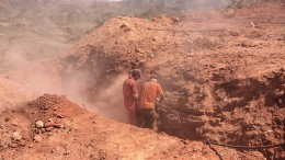 Workers channel-sample a trench in the Hamama West area of Aton Resources’ Abu Marawat gold project in Egypt in 2016.  Credit: Aton Resources.