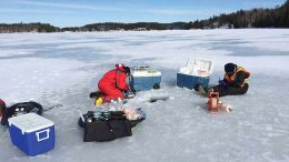 At a nickel-copper mine in northern Ontario, personnel in Lesley Warren’s group collect winter samples for geochemical and microbiological analyses from a tailings pond. Credit: Lassonde Mining Institute.