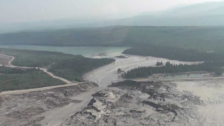 Material flows out of the tailings pond breach in August 2014 at Imperial Metals’ Mount Polley gold-copper mine, 140 km southeast of Quesnel, British Columbia. Credit: Cariboo Regional District.