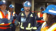Frédéric Langevin (centre), mine manager at Agnico Eagle Mines' Goldex gold mine in Val-d'Or, Que., guides visitor on an underground tour in June 2017. Photo by John Cumming.