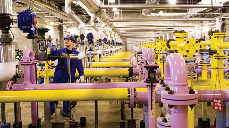 Workers inside Cameco’s uranium conversion plant in Port Hope, Ontario. Credit: Cameco.