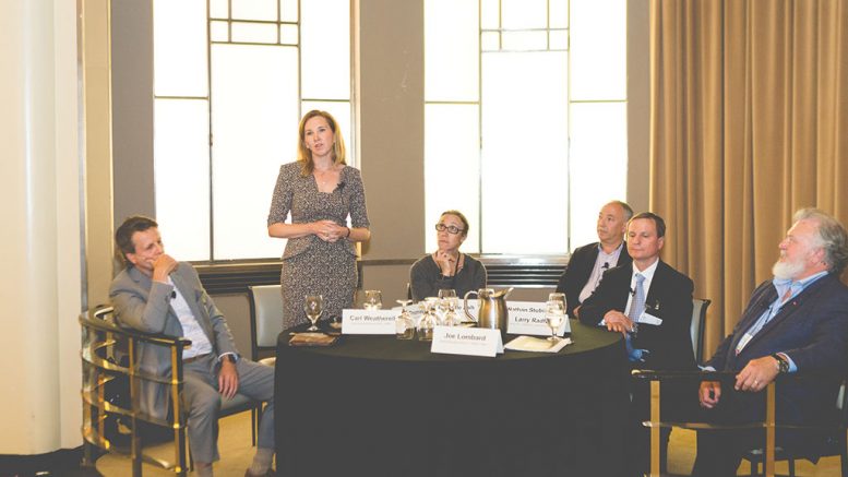 Eira Thomas, director of Lucara Diamond, stands to address delegates during a roundtable at the Progressive Mine Forum organized by The Northern Miner in October. Photo by George Matthew Photography.