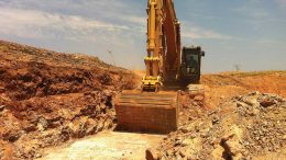 An excavator moves earth at Novo Resources’ Beaton’s Creek gold property in Western Australia. Credit: Novo Resources.