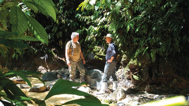 Jean-Paul Pallier (left), Aurania Resources’ vice-president of exploration, and Richard Spencer, president, discussing stream sediment sampling techniques at the Lost Cities-Cutucu gold project in Ecuador. Credit: Aurania Resources.