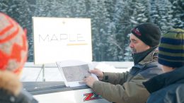 Fred Speidel, Maple Gold Mines’ vice-president of exploration, holds a map at the Douay gold project in Quebec’s Abitibi greenstone belt. Credit: Maple Gold Mines.