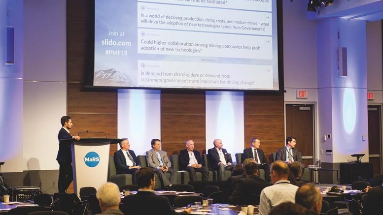 Participants in the clean mining panel field questions from the audience at the Progressive Mine Forum in Toronto, from left: The Northern Miner staff writer Richard Quarisa (moderator), Cory McPhee, Vale’s VP of corporate affairs, communications and sustainability; Carl Weatherell, Canada Mining Innovation Council CEO; Nathan Stubina, McEwen Mining’s managing director of innovation; Jason Goodhand, e-Zn Inc.’s VP of business development; Raziel Zisman, Whittle Consulting’s co-founder and partner; and John Mullally, Goldcorp’s VP of corporate affairs and energy regulation. Photo by George Matthew Photography.