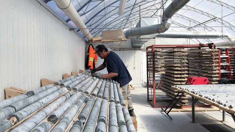 A worker in the core shack at the Troilus gold project. Credit: Troilus Gold.