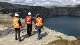 A geology team looks over the historic Z87 pit at Troilus Gold’s namesake project in Quebec. Credit: Troilus Gold.