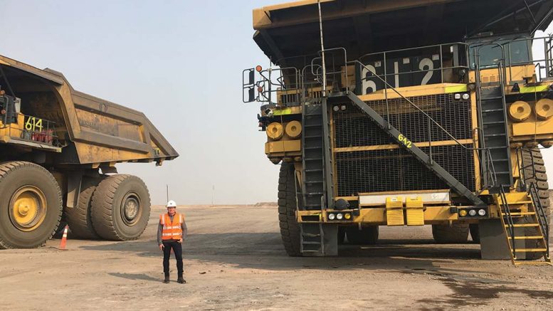 Ewan Downie — president and CEO of Thunder Bay, Ontario-based Premier Gold Mines — beside trucks at Premier’s 40%-owned South Arturo gold mine in Elko County, Nevada, where majority partner Barrick Gold is operator. Credit: Premier Gold Mines.