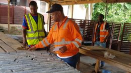Employees study drill core at Thor Explorations' Segilola gold project in Nigeria. Credit: Thor Explorations.