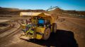 BHP and Rio Tinto test electric trucks to clean up iron ore