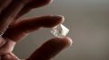 Ex-De Beers chief leads bid for diamond giant